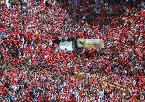 Millions of Venezuelans take to the streets to pay tribute to President Hugo Chávez, as his body is taken from the military hospital where he died to the National Military Academy to lie in state, March 6, 2013