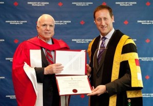Defence Minister Peter MacKay bestows an honorary doctorate upon U.S. warmonger Sen. John McCain at the Canadian embassy in Washington, June 18, 2013. | THE CANADIAN PRESS/HO-Canadian embassy