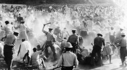 The notorious police of the apartheid regime carry out the Sharpeville massacre, in which a mass protest against the pass laws was brutally put down and 69 people killed, March 21, 1960.